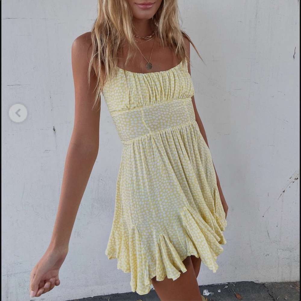 Hello molly yellow floral dress with tie in back! Super cute